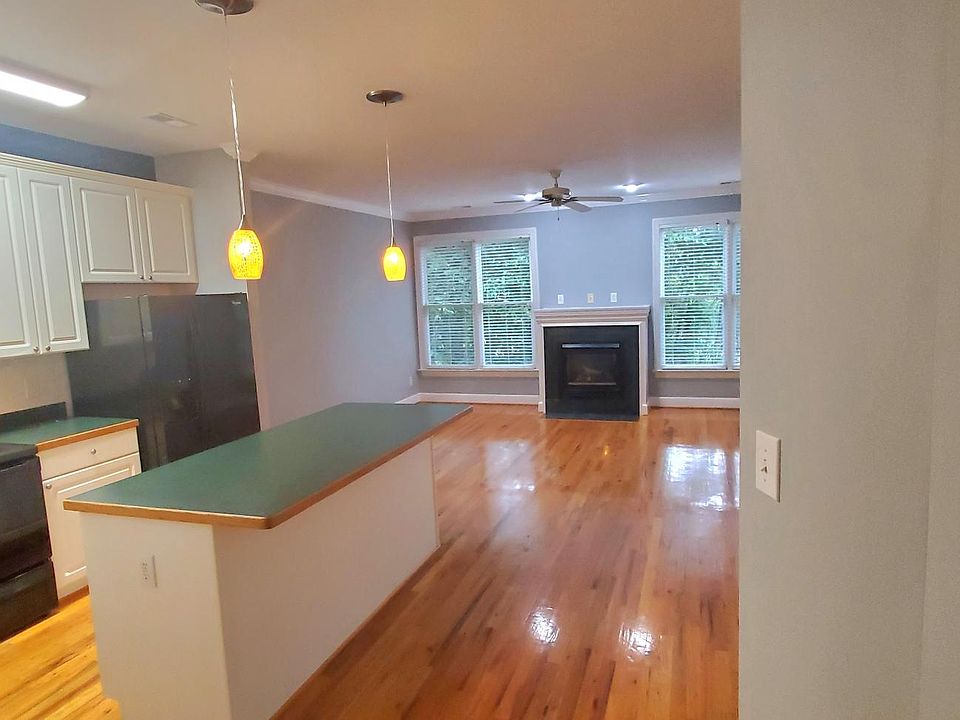 Kitchen and living room taken from main hallway