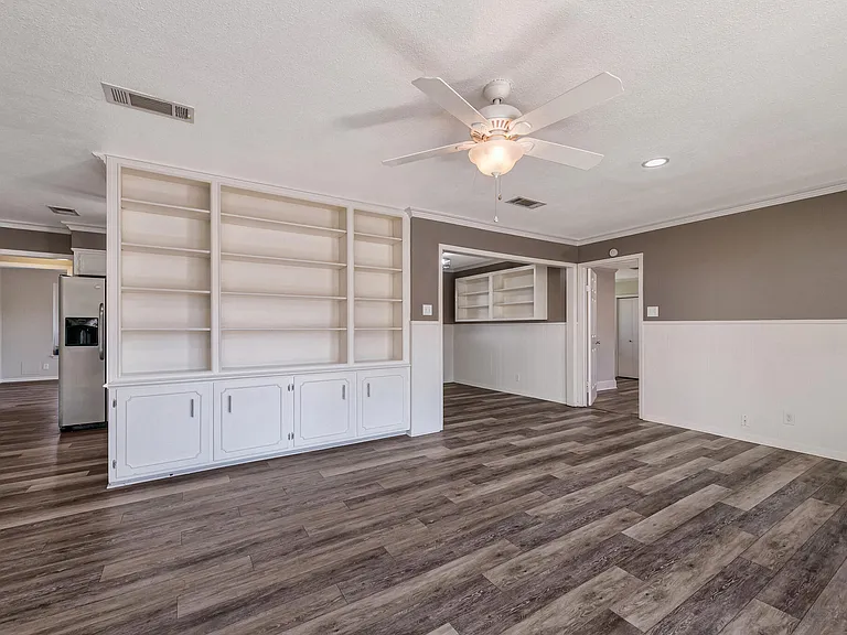 Living room with built in book shelves