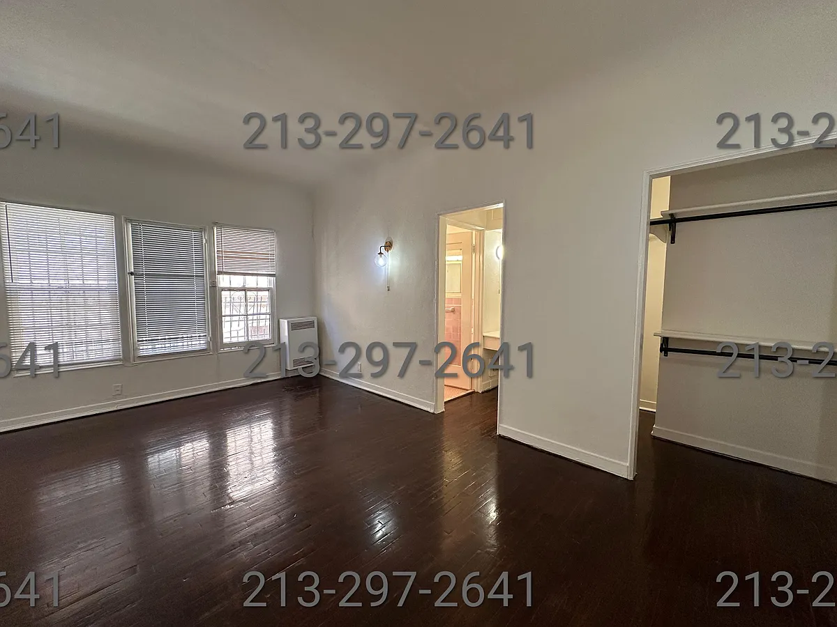 Building Photo - 7063 Lanewood Ave #104