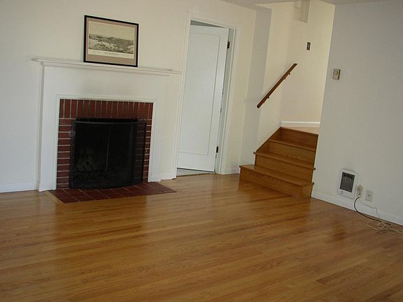 living room with fireplace, bedrooms and bath up stairs