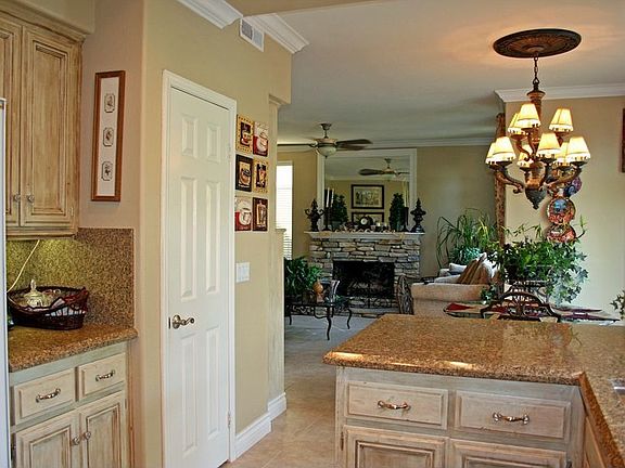 Recessed lighting, double crowned molding, Italian Stone flrs 