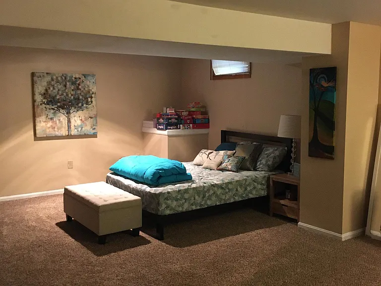 This finished basement can be used as a fourth bedroom if needed