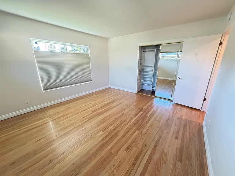 Bedroom 2 with organized closet