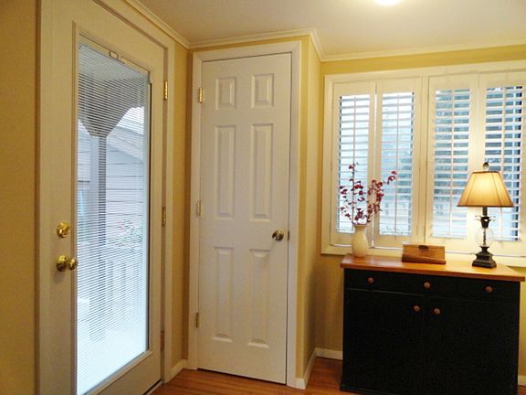 Stepping inside you'll be greeted by this cozy welcoming foyer offering immediate views of both the 