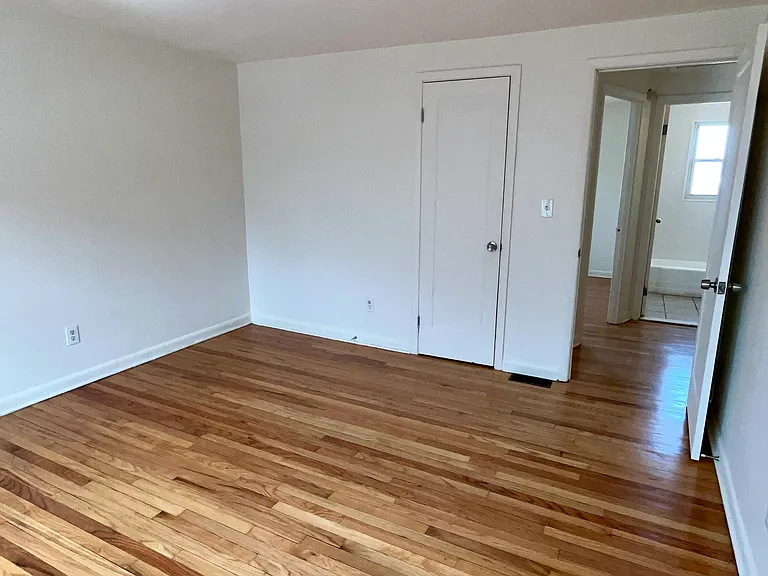 Hardwood floor, bedroom #1 with 2 closets.