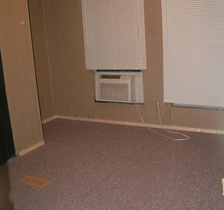 one bedroom with plumbing available taht was previously removed for a 2nd bath