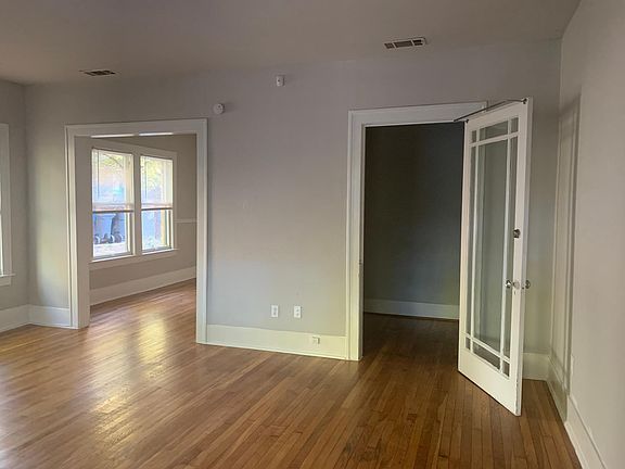 Natural hardwood floors with a lot of sunlight.