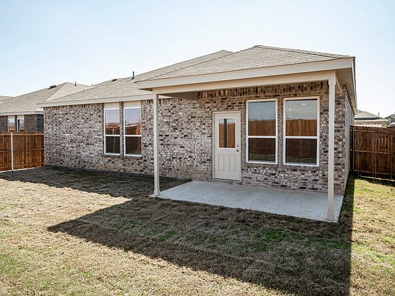 Covered patio off back of home