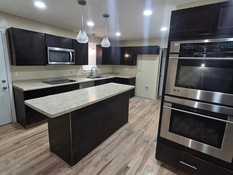 Large kitchen open to family room and connects to formal dining room