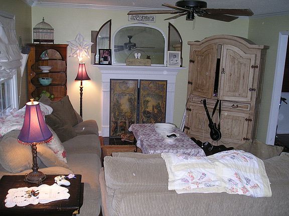 Livingroom with hardwoods,gas fireplace,and crown molding.