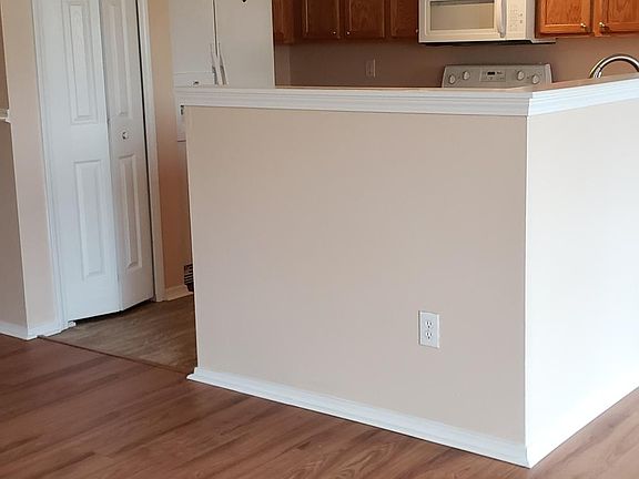 Open concept kitchen, dining area, and living room