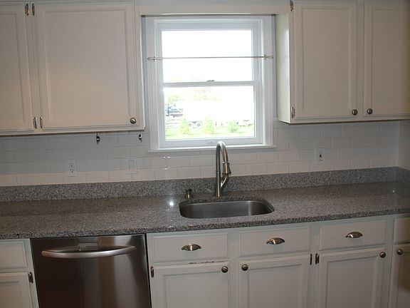 newly remodeled galley kitchen with top-of-the line KitchenA