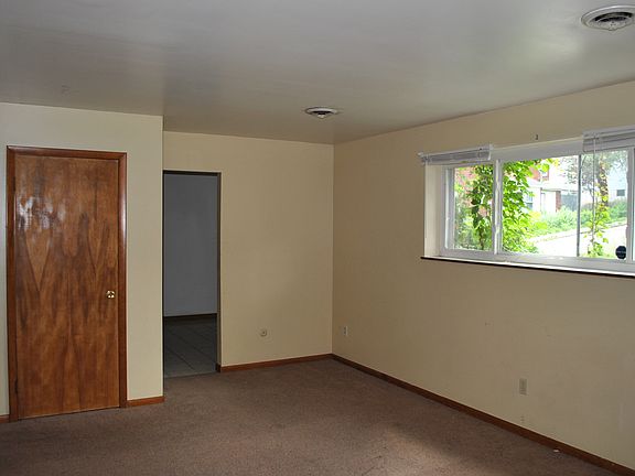 Nice size, bright living room with a coat closet.