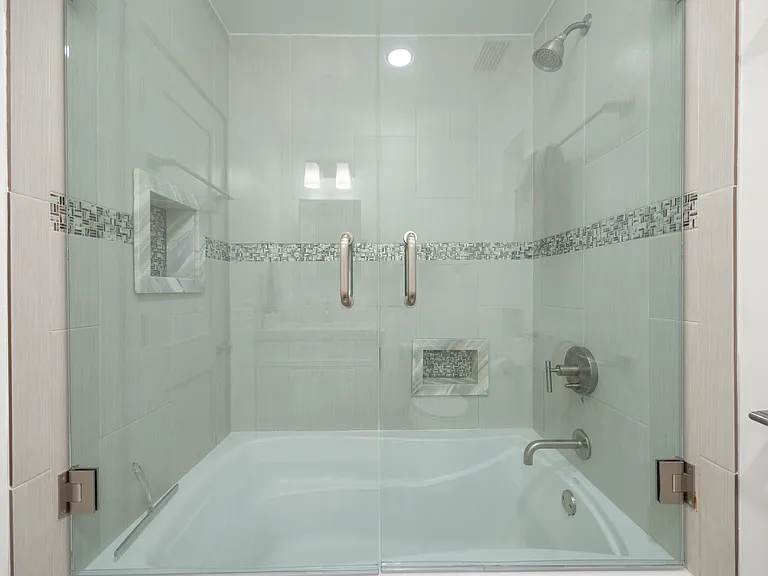 Hall bathroom with tub/shower.