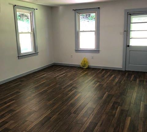 Great living room space! Perfect for a combined living/dining/office!