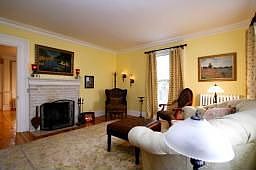 Living room with wood burning fireplace