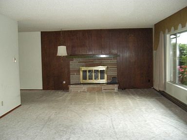 large living room w/wood fireplace