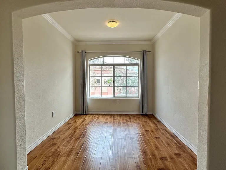 A third room that is for dining but can be used as a workspace.