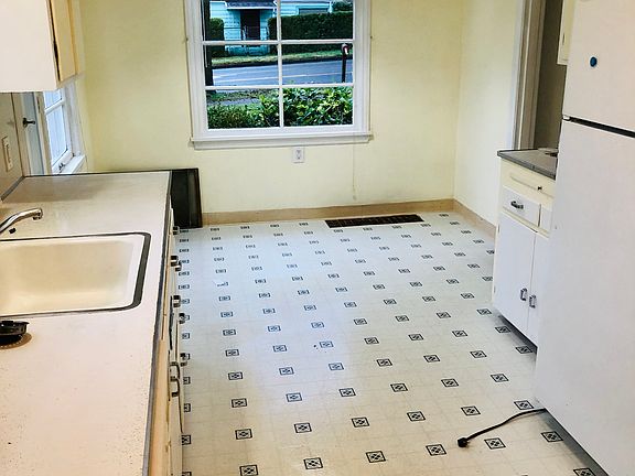 Large, bright kitchen with generous counter space.