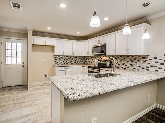 4th image of 8128 Downe Dr