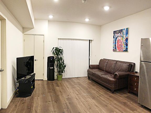 Living with hardwood flooring and LED lighting fixtures