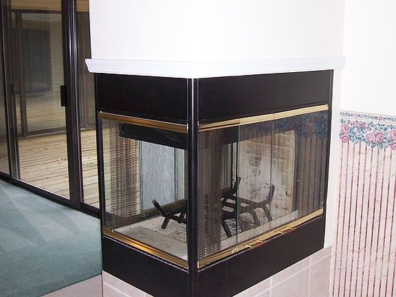 Fireplace between Living & Dining Rooms