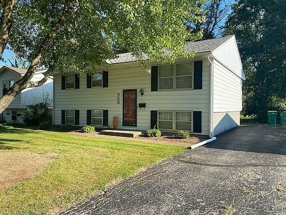 Front and asphalt driveway
