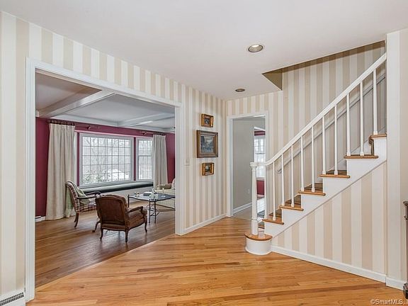 Hardwood in spacious foyer.