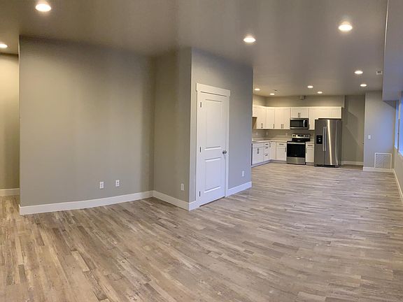 living space, open concept into the dining area and kitchen