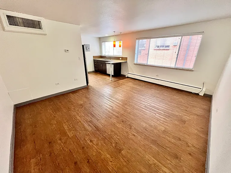 Experience light-filled living with sleek wooden floors and a functional layout. Experience light-filled living with sleek wooden floors and a functional layout.