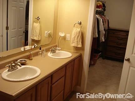 Master Bath with walk-in closet
						:
						Double sink - 5 ft. shower with glass door - spacious walk-in closet
