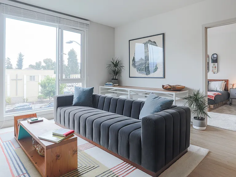Light-filled living with modern comfort and seamless flow into the bedroom.