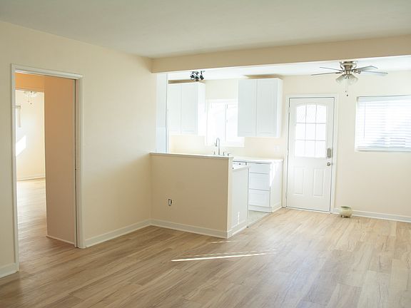 The other half of the living room, facing the kitchen.