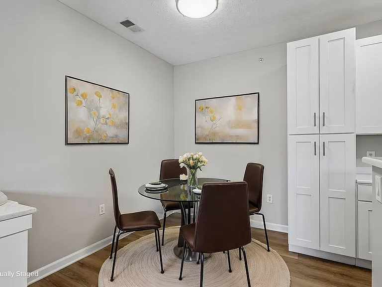 Inviting dining area with chic glass table