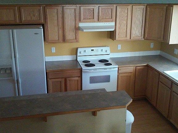 Kitchen view coming down the stairs
