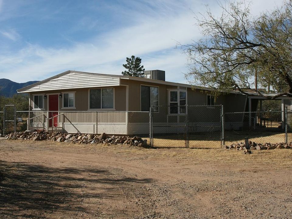 Fenced in area around home.