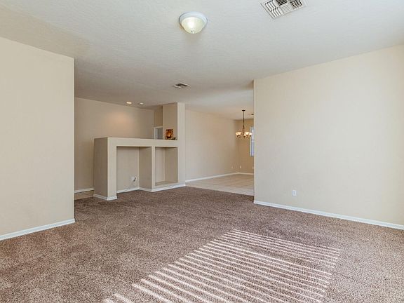 Living room opens to dining