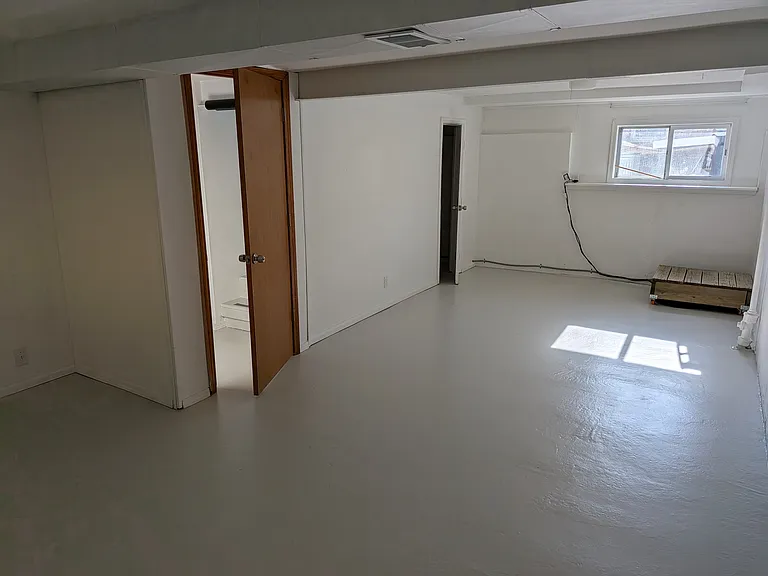 Basement bonus room, stairs (center), closet (right)