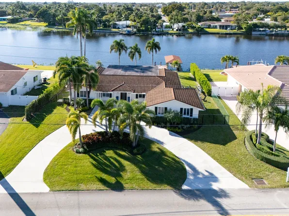 7025 Pine Tree Lane, Lake Clarke Shores, FL 33406