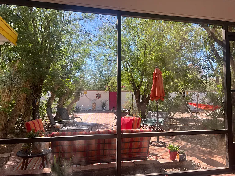 Beautiful view from the large Arizona room of the 1/4 acre yard.