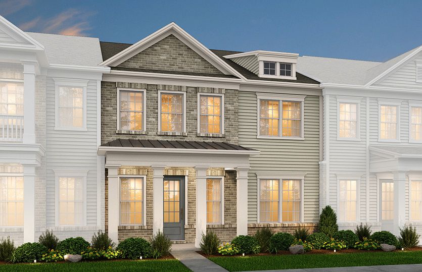 Hayden Exterior 4 features Brick, Hardi Board siding, covered front porch and rear 2 car garage