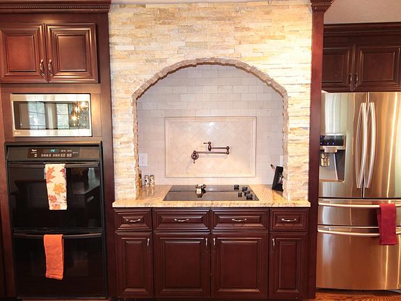 Stone and Tile Surround with Pot-Filler