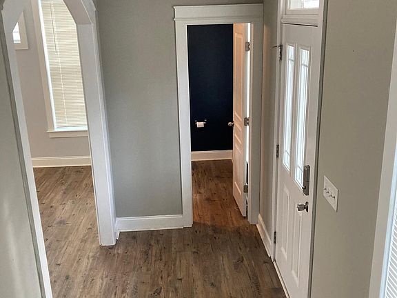 Spacious entryway and downstairs half bath