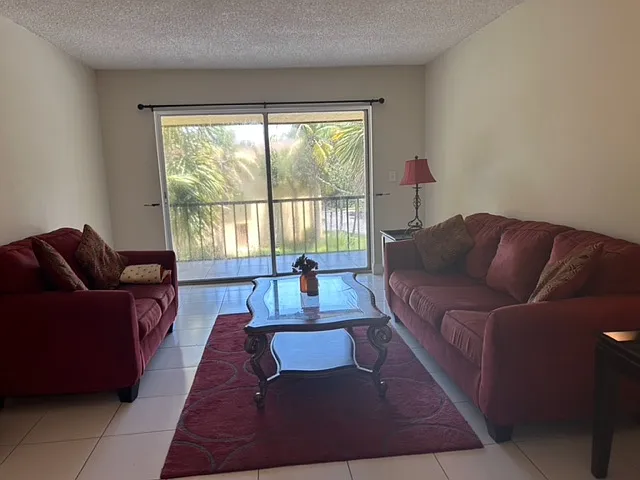 nicely furnished with matching sofa and loveseat