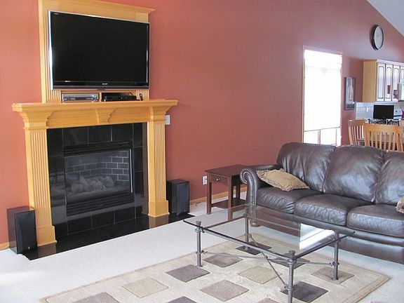 Fireplace in family room.
						:
						Family room is 20'6" x15'6"
TV area is wired in walls for surround sound.
