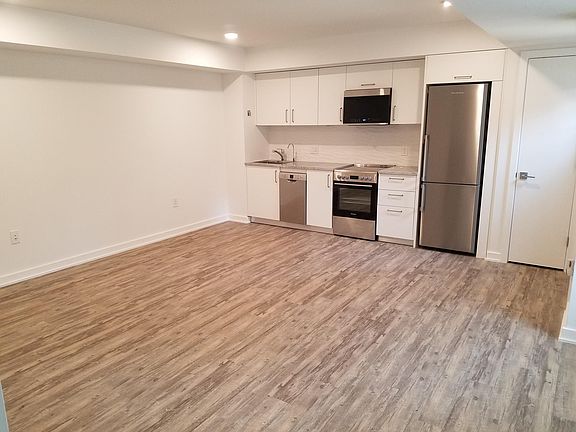 Kitchen/Living room. New European cabinets/appliances.