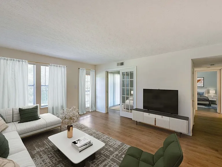 Renovated Meadows II living room with hard surface flooring