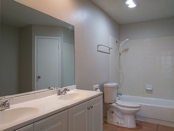 Master dual sink vanities and dual walk-in closets