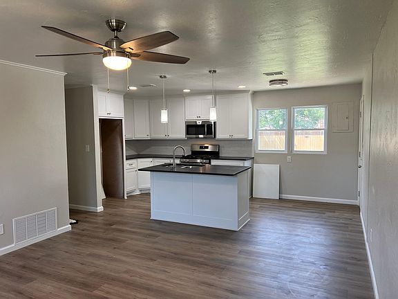 Kitchen/living/dining. all new cabinets, appliances, granite countertops