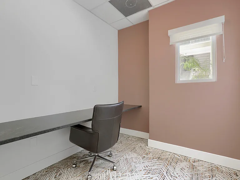 Your private office, just steps away. Garrett Uptown's business center includes a rentable office with a built-in desks for privacy, making it the perfect spot for focused work without leaving home.